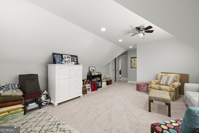 106 Chase Ln, Forsyth, GA 31029 - living area with light colored carpet, a ceiling fan, lofted ceiling, and recessed lighting