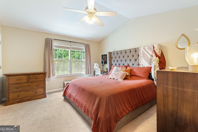 bedroom with vaulted ceiling, carpet floors, ceiling fan, and baseboards