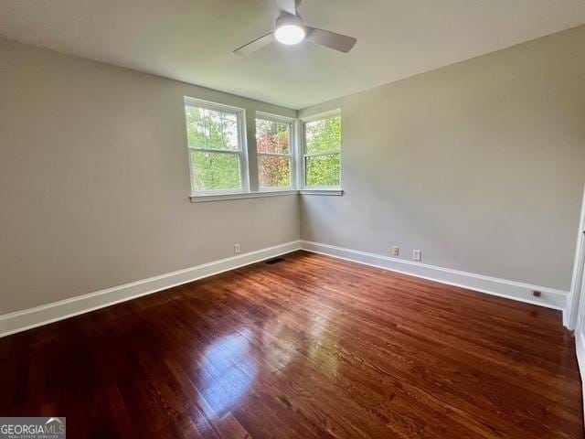 617 Smith St S, Bremen, GA 30110 - spare room featuring baseboards, a ceiling fan, and wood finished floors