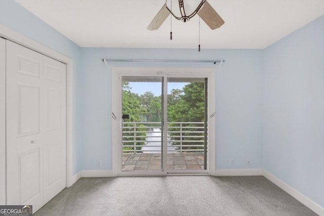 175 Palmera Ln, Brunswick, GA 31525 - unfurnished bedroom with carpet flooring, access to outside, baseboards, and ceiling fan