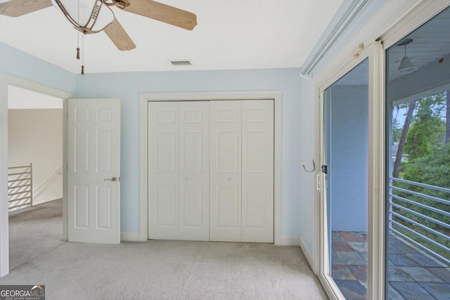 175 Palmera Ln, Brunswick, GA 31525 - unfurnished bedroom with light carpet, a closet, and baseboards