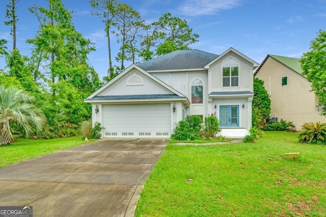175 Palmera Ln, Brunswick, GA 31525 - traditional home with french doors, a front yard, concrete driveway, a garage, and stucco siding