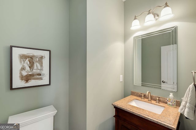 210 Wentworth Ter, Alpharetta, GA 30022 - half bath featuring vanity and toilet