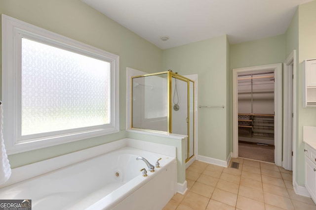 210 Wentworth Ter, Alpharetta, GA 30022 - full bath with a stall shower, a whirlpool tub, tile patterned flooring, and vanity