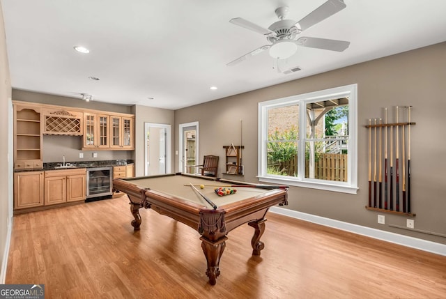 210 Wentworth Ter, Alpharetta, GA 30022 - recreation room with beverage cooler, wet bar, baseboards, light wood-style flooring, and recessed lighting