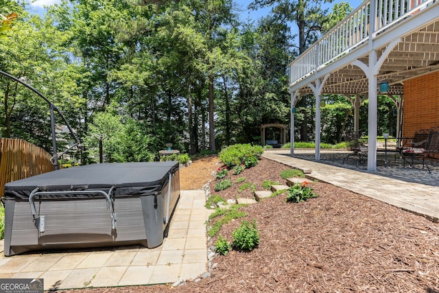 210 Wentworth Ter, Alpharetta, GA 30022 - view of yard with a hot tub, a patio area, and view of scattered trees