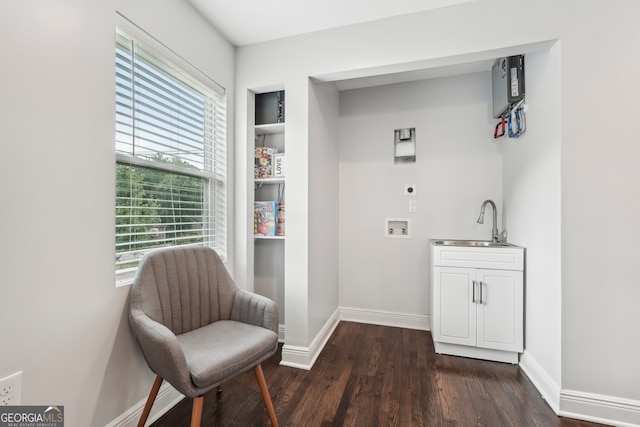 1605 Wellswood Dr SE, Atlanta, GA 30315 - laundry area featuring hookup for an electric dryer, dark wood-style floors, healthy amount of natural light, and baseboards