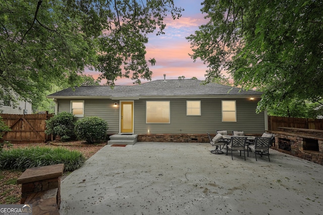 1605 Wellswood Dr SE, Atlanta, GA 30315 - back of house featuring a patio, fence, and a shingled roof