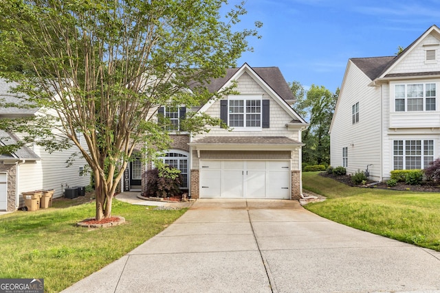 355 Pintail Ct, Suwanee, GA 30024 - view of front facade featuring concrete driveway, brick siding, central air condition unit, and a front lawn