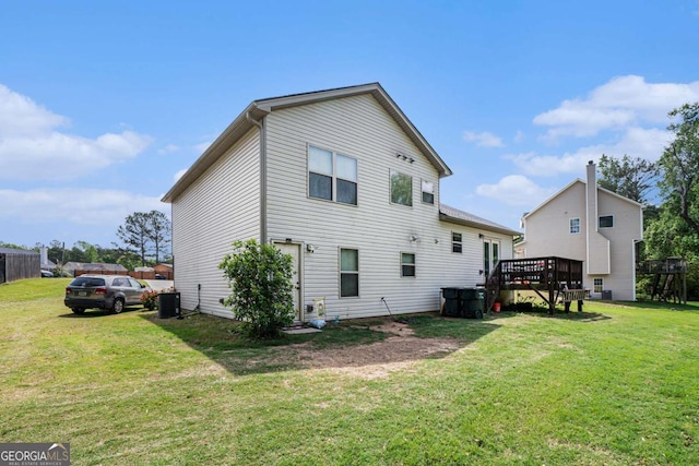 1605 Deer Creek Ln, Monroe, GA 30655 - back of house with a deck and a lawn