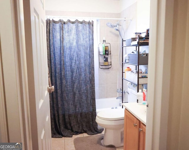 bathroom featuring tile patterned flooring, shower / bath combination with curtain, toilet, and vanity
