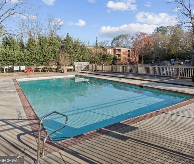 community pool with fence