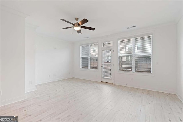 1309 Bennett Creek Ovlk, Suwanee, GA 30024 - spare room featuring a ceiling fan, light wood finished floors, and baseboards