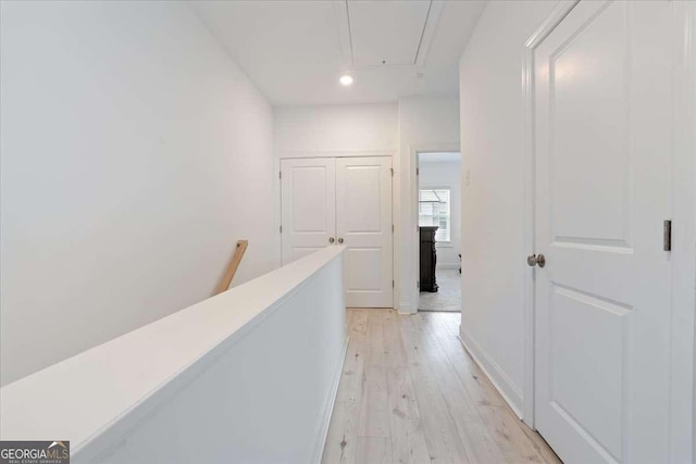 1309 Bennett Creek Ovlk, Suwanee, GA 30024 - corridor featuring attic access, light wood finished floors, an upstairs landing, baseboards, and recessed lighting