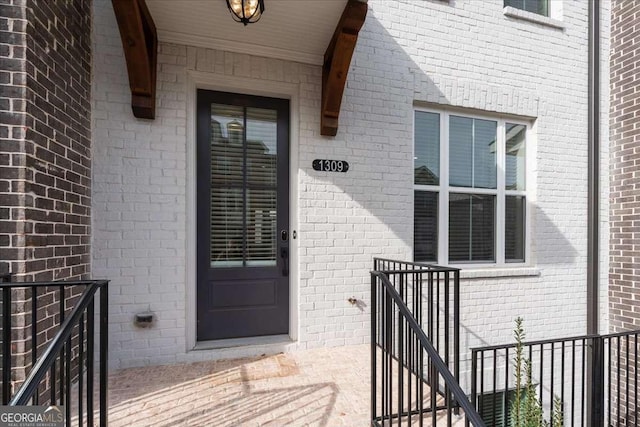 1309 Bennett Creek Ovlk, Suwanee, GA 30024 - doorway to property with brick siding