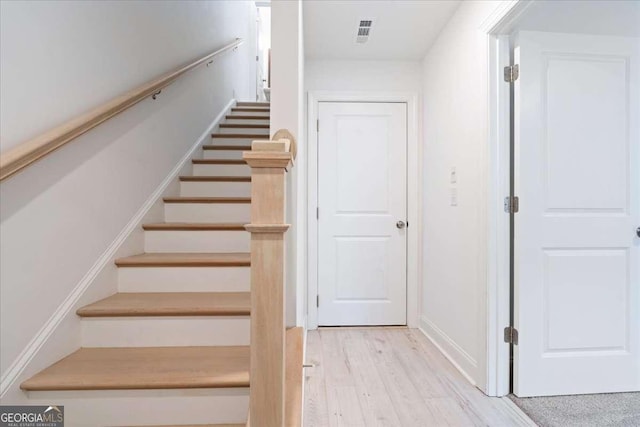 1309 Bennett Creek Ovlk, Suwanee, GA 30024 - stairs with wood finished floors and baseboards