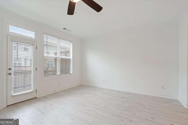 1309 Bennett Creek Ovlk, Suwanee, GA 30024 - spare room with a ceiling fan, light wood-type flooring, and baseboards