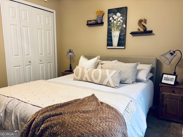 486 Village Cir, Stockbridge, GA 30281 - bedroom featuring a closet and carpet flooring