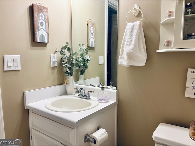 486 Village Cir, Stockbridge, GA 30281 - half bathroom featuring toilet and vanity