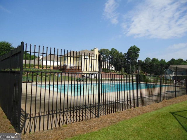 486 Village Cir, Stockbridge, GA 30281 - community pool featuring fence