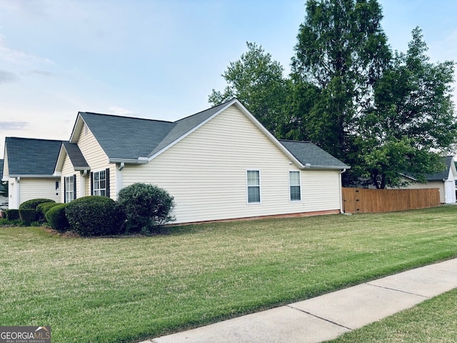 486 Village Cir, Stockbridge, GA 30281 - view of property exterior featuring a shingled roof