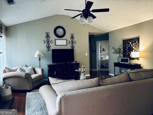 486 Village Cir, Stockbridge, GA 30281 - living area with wood finished floors, vaulted ceiling, ceiling fan, and baseboards