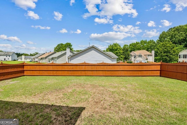 view of yard featuring a residential view