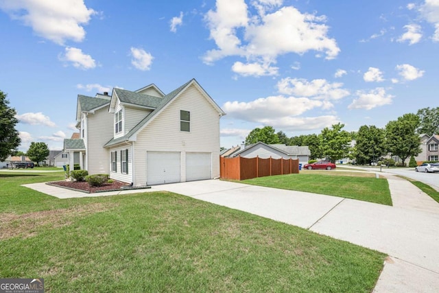 view of front of home featuring a garage and concrete driveway