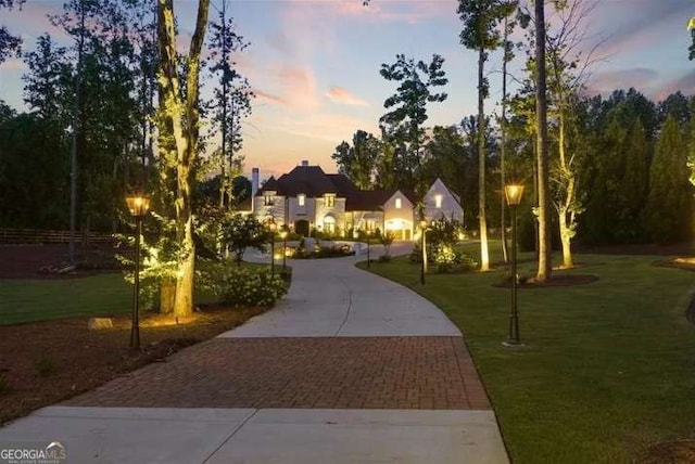 2242 Shoal Creek Rd, Buford, GA 30518 - surrounding community featuring decorative driveway and a lawn