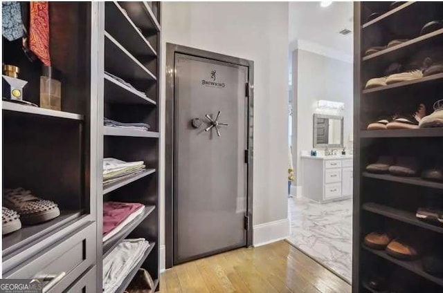 2242 Shoal Creek Rd, Buford, GA 30518 - spacious closet featuring light wood finished floors