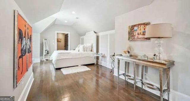 2242 Shoal Creek Rd, Buford, GA 30518 - bedroom with wood finished floors and lofted ceiling