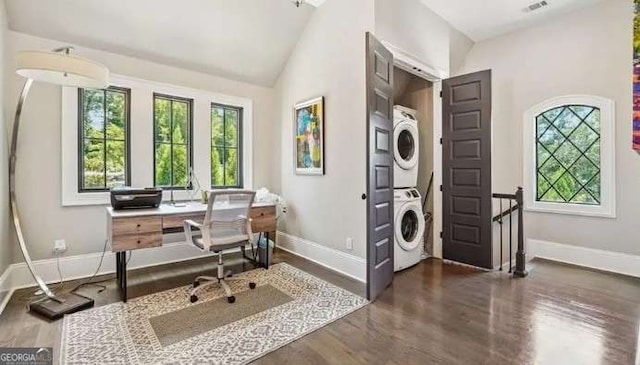 2242 Shoal Creek Rd, Buford, GA 30518 - office featuring stacked washing machine and dryer, baseboards, wood finished floors, and lofted ceiling