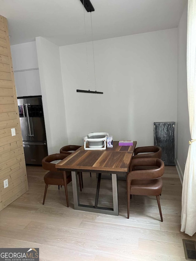 dining room featuring light wood finished floors