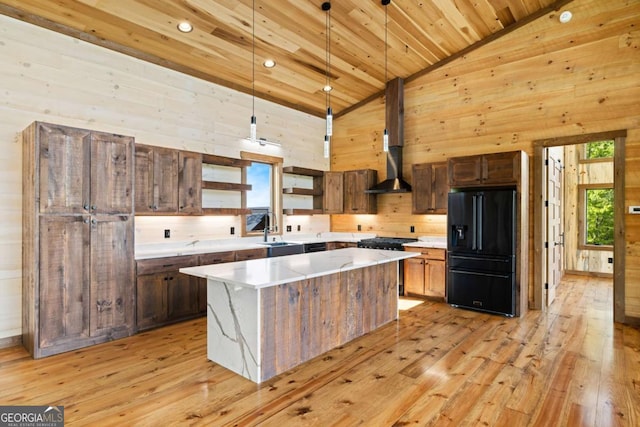 885 Tower Rd, Mineral Bluff, GA 30559 - kitchen featuring black fridge, a sink, open shelves, light wood-style floors, and wood ceiling