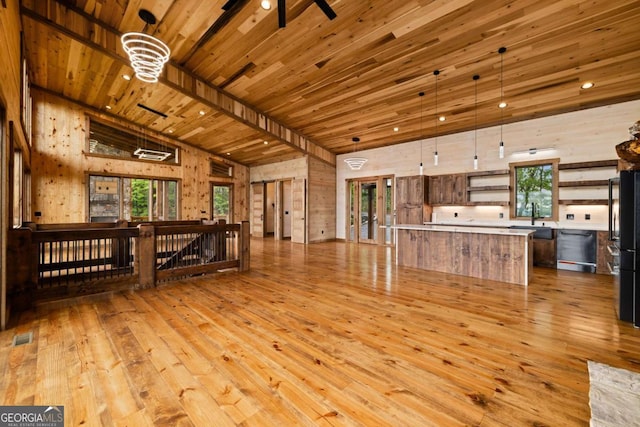 885 Tower Rd, Mineral Bluff, GA 30559 - unfurnished living room with lofted ceiling, light wood-style flooring, a ceiling fan, a sink, and wooden ceiling