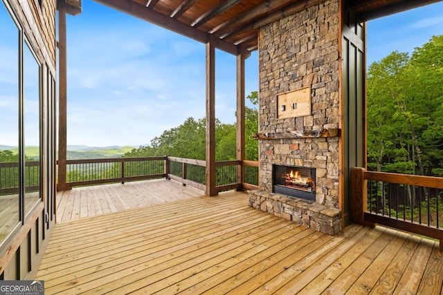 885 Tower Rd, Mineral Bluff, GA 30559 - wooden terrace featuring a fireplace