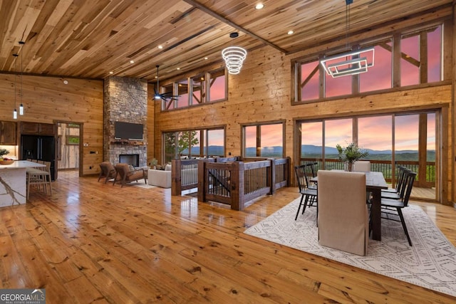 885 Tower Rd, Mineral Bluff, GA 30559 - dining space featuring a high ceiling, recessed lighting, hardwood / wood-style flooring, wooden walls, and wooden ceiling
