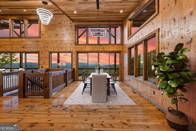 885 Tower Rd, Mineral Bluff, GA 30559 - sunroom with a high ceiling, wood walls, wood ceiling, recessed lighting, and hardwood / wood-style floors