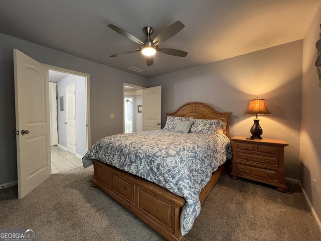 24 Douglas Dr, Jefferson, GA 30549 - bedroom with light colored carpet, baseboards, and a ceiling fan