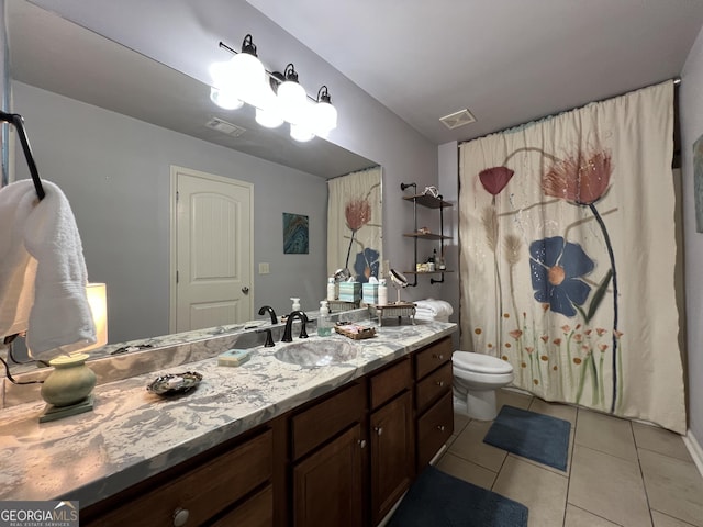 24 Douglas Dr, Jefferson, GA 30549 - full bath with tile patterned flooring, toilet, and vanity
