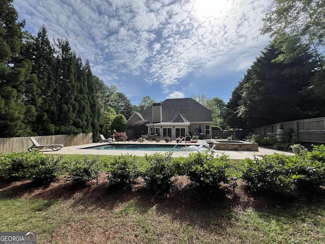 24 Douglas Dr, Jefferson, GA 30549 - view of swimming pool with a patio, an outdoor hot tub, and a diving board