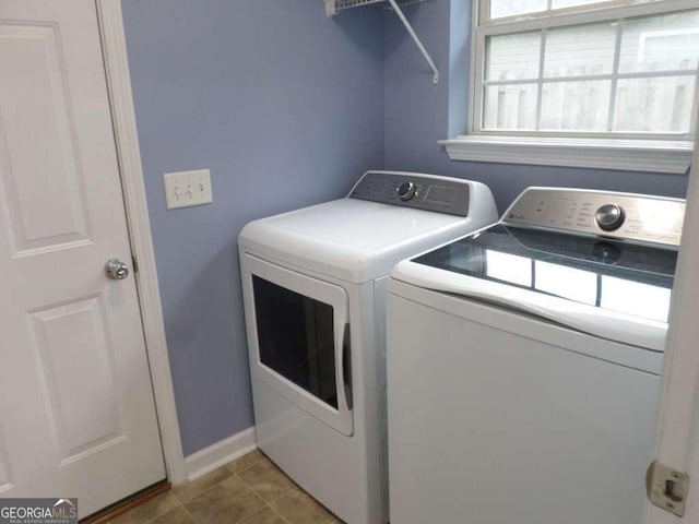 124 Fontenot Dr, Savannah, GA 31405 - laundry area featuring independent washer and dryer, baseboards, and tile patterned floors