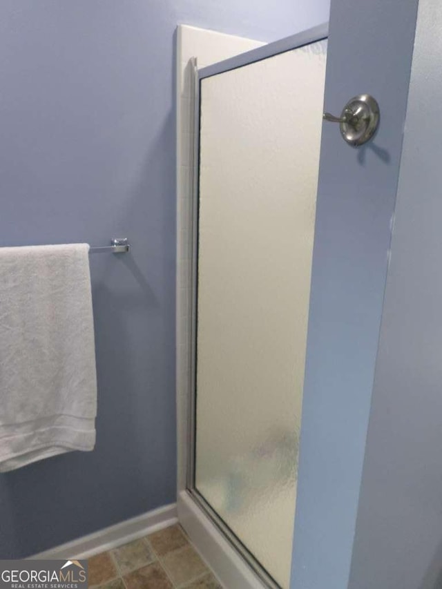 124 Fontenot Dr, Savannah, GA 31405 - full bathroom with a shower stall and baseboards