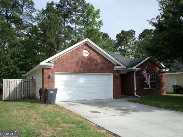 124 Fontenot Dr, Savannah, GA 31405 - single story home featuring brick siding, concrete driveway, and a garage