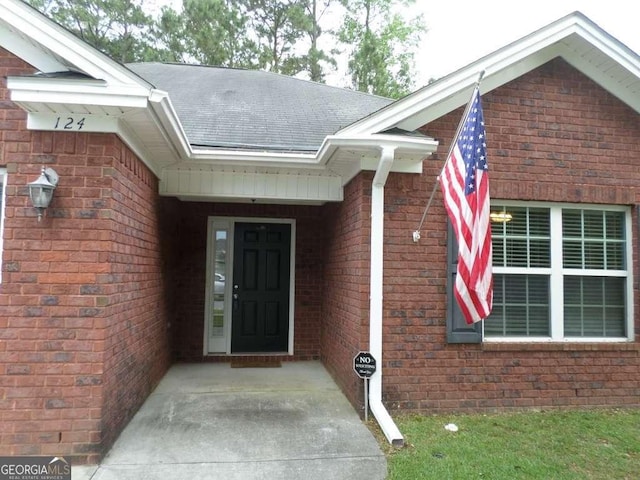 124 Fontenot Dr, Savannah, GA 31405 - property entrance featuring brick siding and a shingled roof