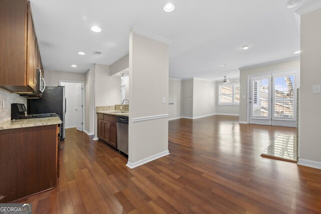 1538 Chantilly Dr NE Unit 224, Atlanta, GA 30324 - spare room with ceiling fan, crown molding, dark wood-style flooring, and baseboards