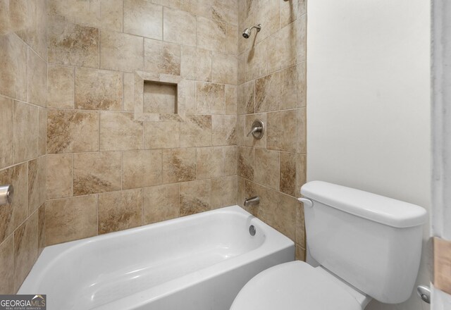 1538 Chantilly Dr NE Unit 224, Atlanta, GA 30324 - bathroom featuring double vanity, toilet, and shower / bath combination