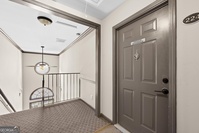 1538 Chantilly Dr NE Unit 224, Atlanta, GA 30324 - entryway with carpet floors, crown molding, and baseboards