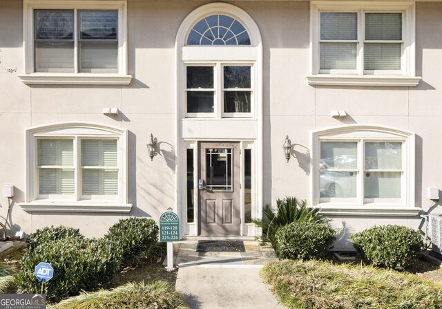 1538 Chantilly Dr NE Unit 224, Atlanta, GA 30324 - multi unit property with a chimney, stucco siding, and central AC unit