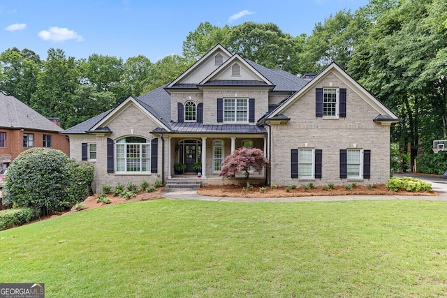 2332 Autumn Maple Dr, Braselton, GA 30517 - view of front of property featuring a porch, brick siding, a front yard, and a shingled roof